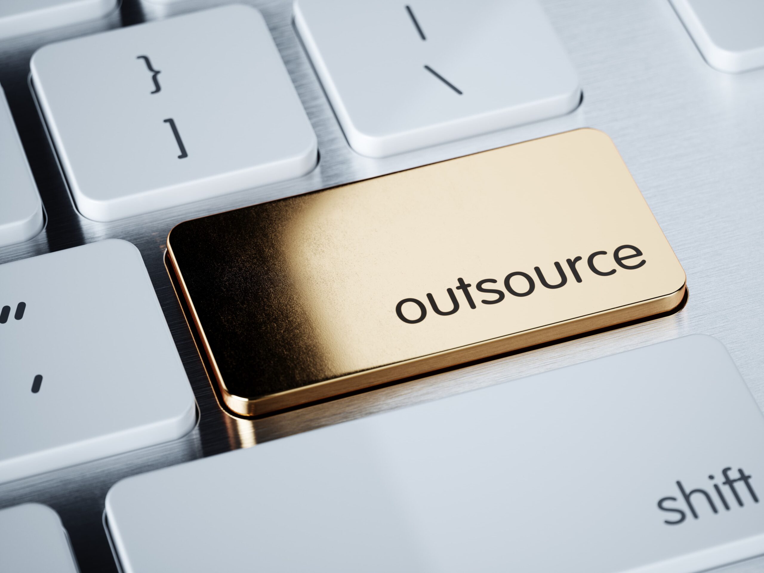 keyboard with outsource key highlighted